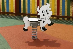 Balancin de muelle Vaca en un parque infantil